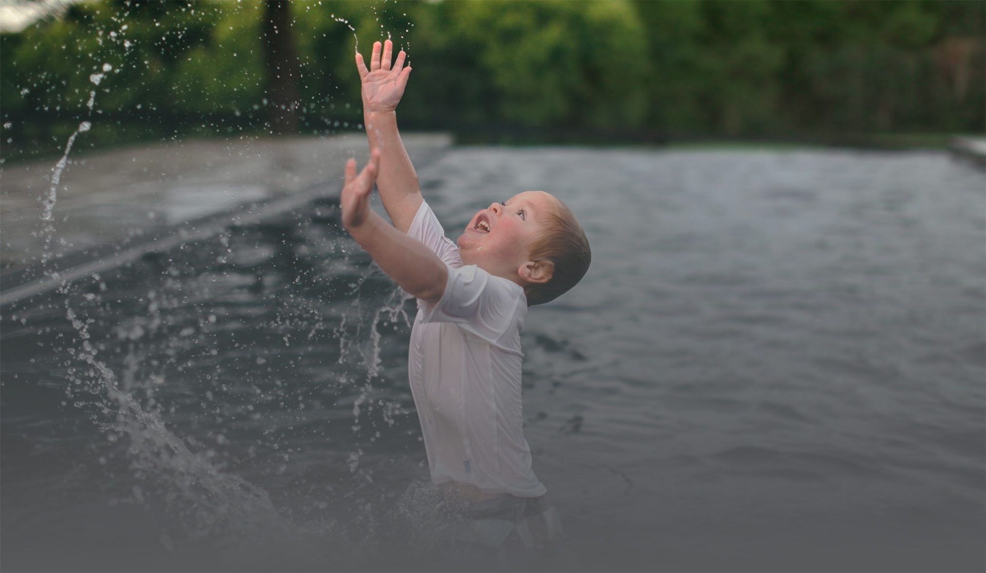 Imagine Pools Boy Playing In Pool DBJ Pools: piney flats, tennessee’s premier pool builder